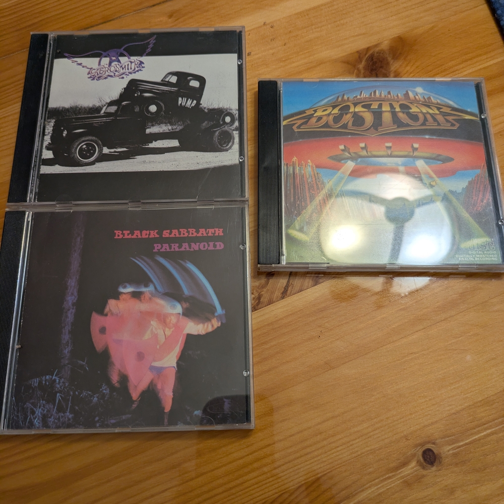 Cds Aerosmith, Black Sabbath, and Boston CD Collection - Black and Multicolor
